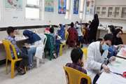 انجام وارنیش فلوراید تراپی مرکز بهداشت جنوب تهران برای دانش آموزان مدرسه ابتدایی اسدی لاری