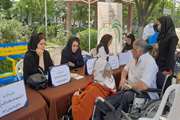 برپایی میز خدمت مرکز بهداشت جنوب تهران در هفته سلامت در بوستان 22 بهمن